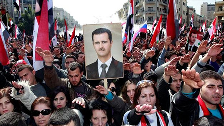 una manifestacion en siria a favor de al assad